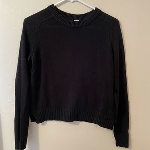 Divided black sweater